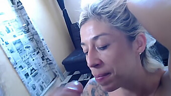 Tattooed Girl Gives A Blowjob And Receives Cum On Her Face