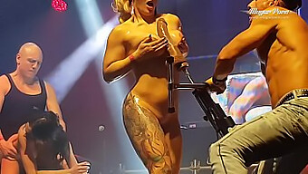 Enjoying The Erotic Atmosphere At A Festival With Tattooed And Busty Performers